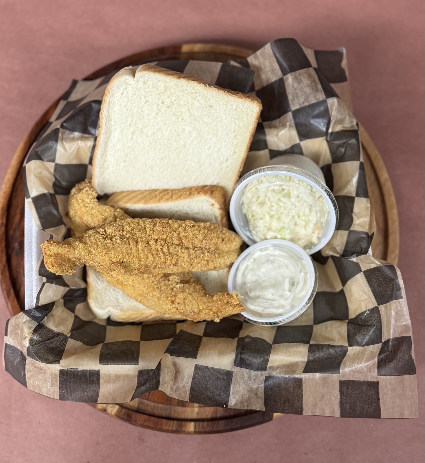 Hand-battered fried catfish basket with slaw, tartar sauce, and bread